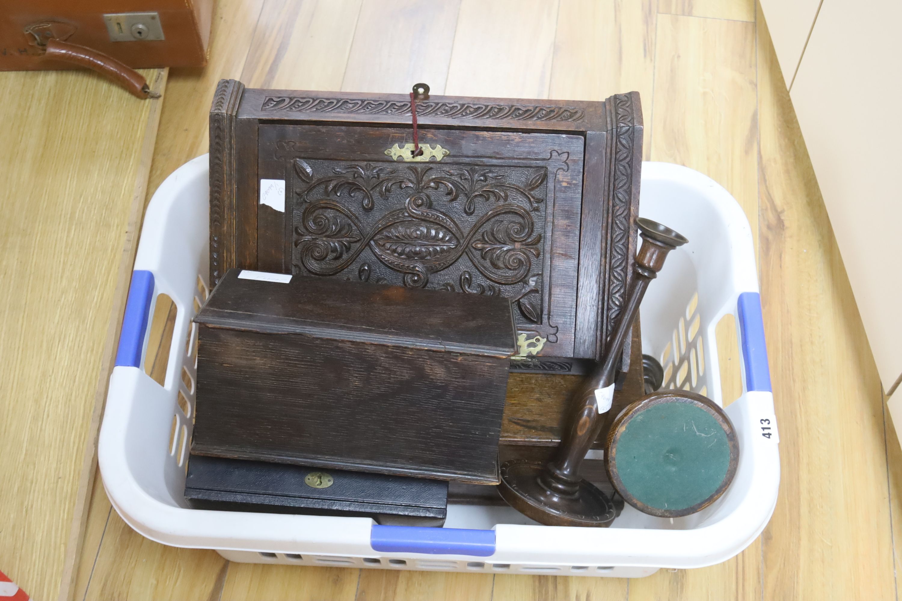 An 18th/19th century oak miniature trunk and miniature corner cupboard, one other miniature oak coffer, pair of candlesticks and leathe